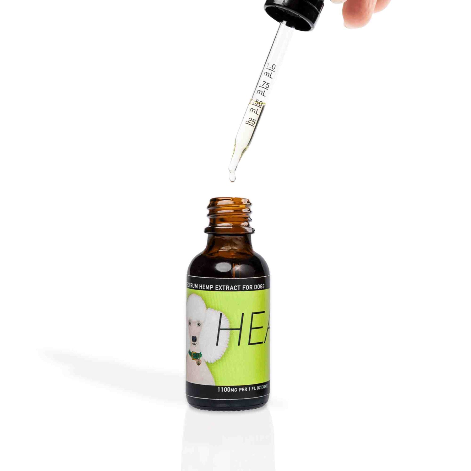 Heal - Full Spectrum Hemp Extract Oil - front of bottle 1 fl oz bottle 1100mg with pipette out of bottle to show what the oil looks like it