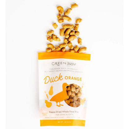 green juju duck orange whole food bites treats coming out of bag